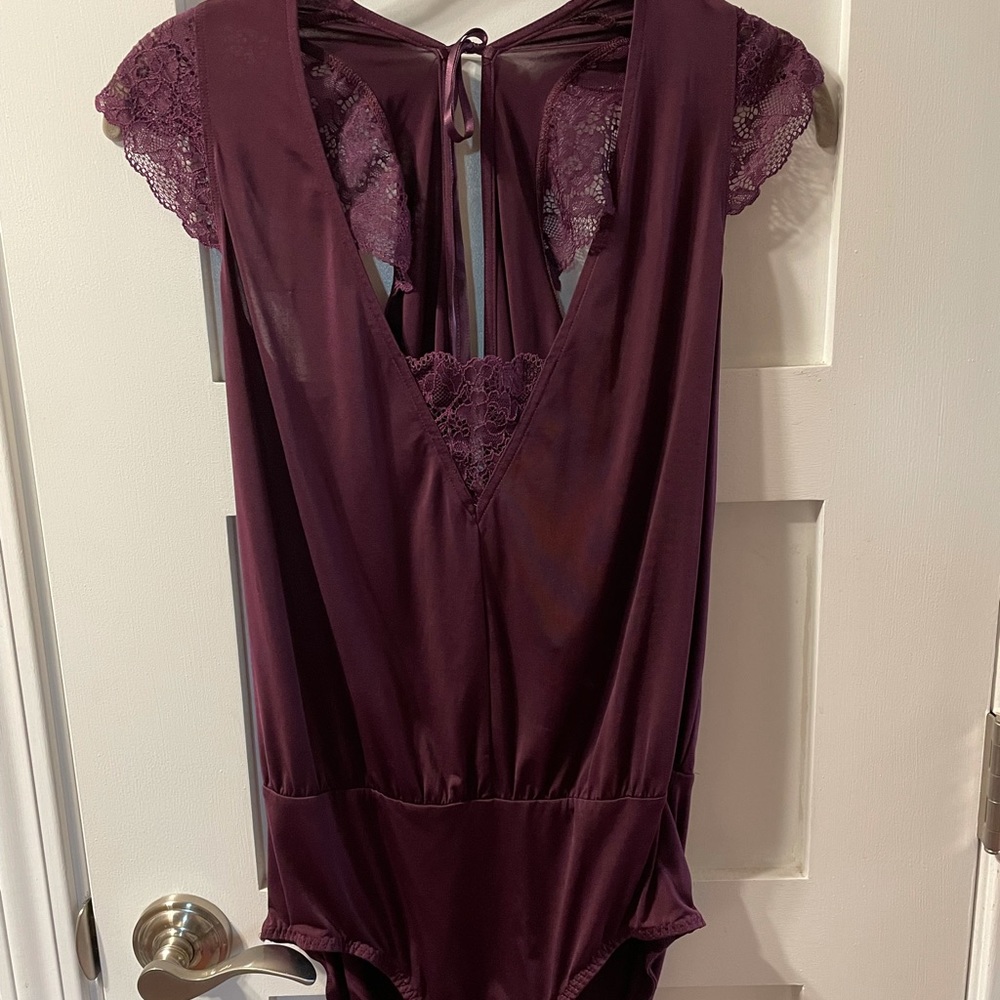 Adore Me deep purple body suit.